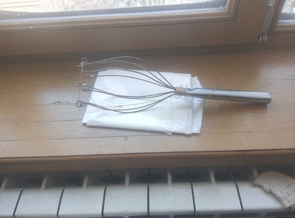 Приспособление для снятия фруктов фруктов с дерева.