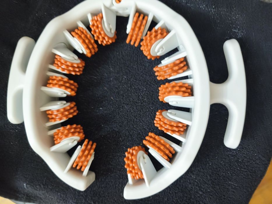 Роликовий ручний масажер