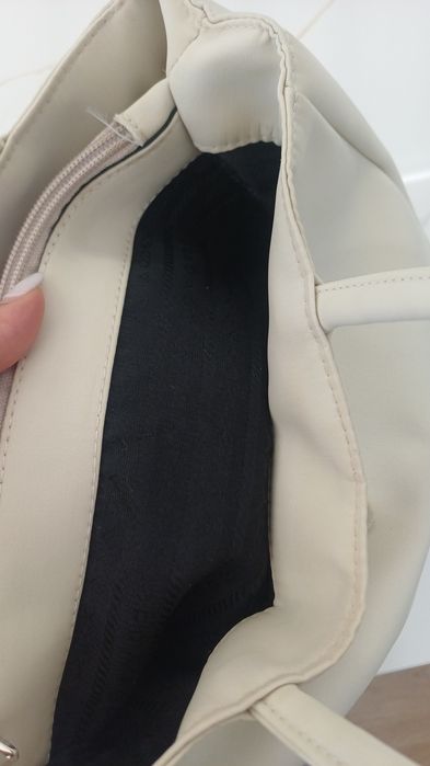 Bolsa bege em bom estado
