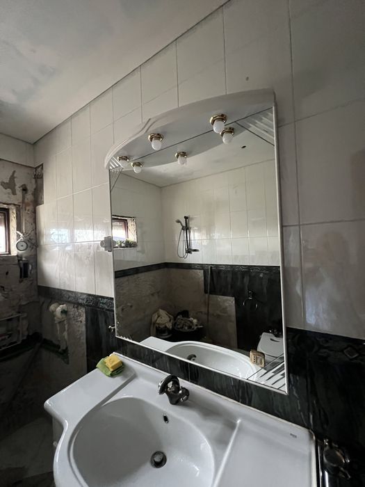 Espelho de casa de banho.