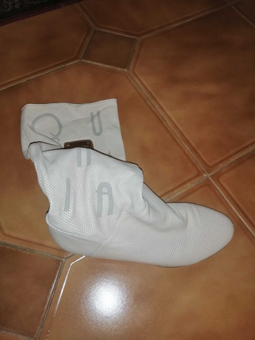 Сапоги кожа. Цвет пудра. Очень красивые. Удобные.