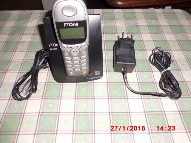 A cordless phone with a base station connected to the landline.64286377875457120