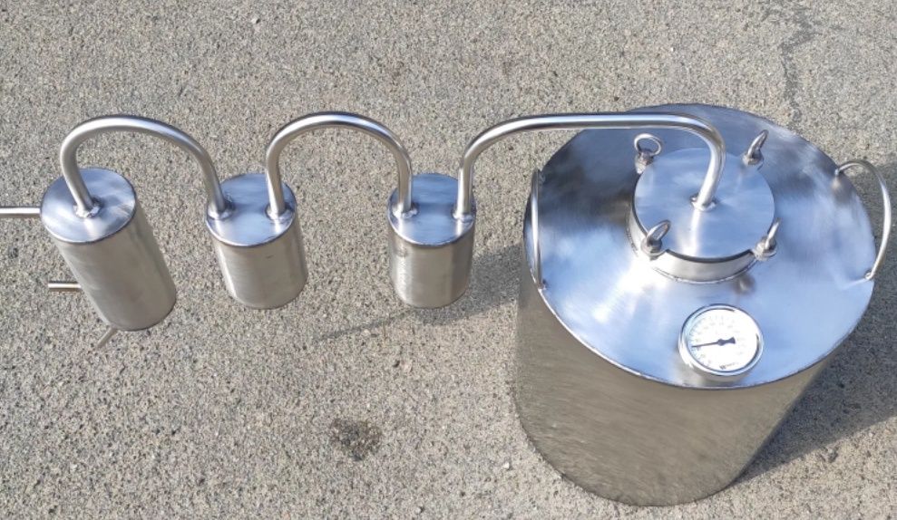 Проточний дистилятор з двома сухорарниками