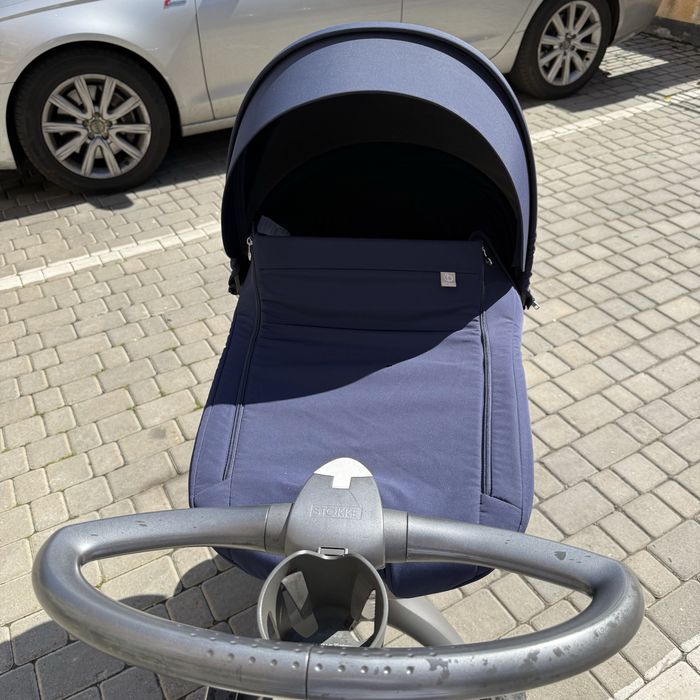 Оригінальна коляска Stokke синя для немовляти хороший стан