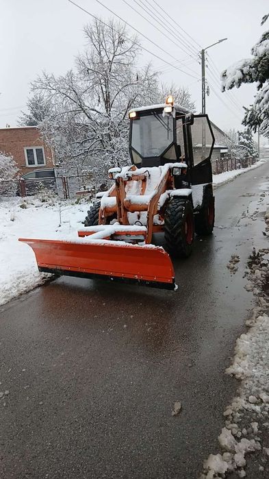 Uslugi ladowarka minikoparka wywrotka odsniezanie transport