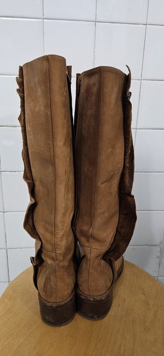 Bota Alta em Pele Mulher