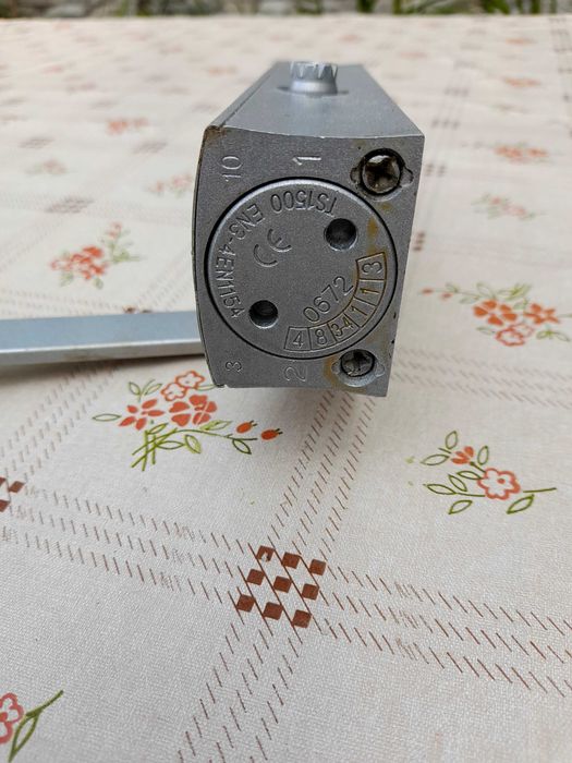 Mola para fecho de porta automático