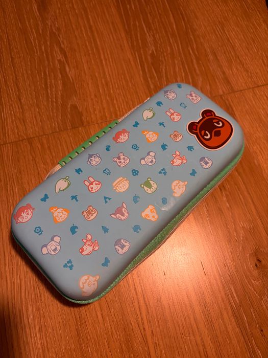 Nintendo Switch Azul/Vermelho + Bolsa Animal Crossing + Grip Joy-Con + Fatura