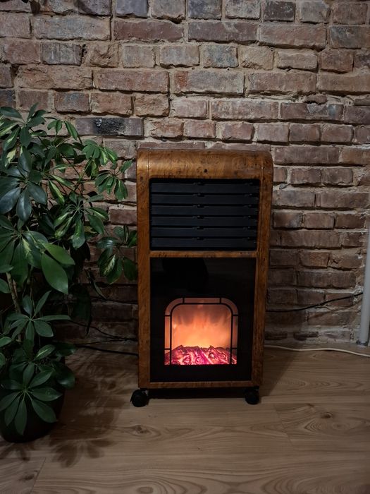 Przenośny grzejnik z funkcją kominka, klimatyzacji oraz jonizacji.