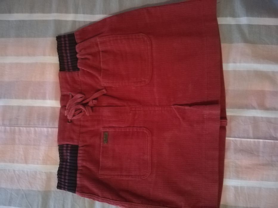 Saia curta  mango em bom estado pouco uso