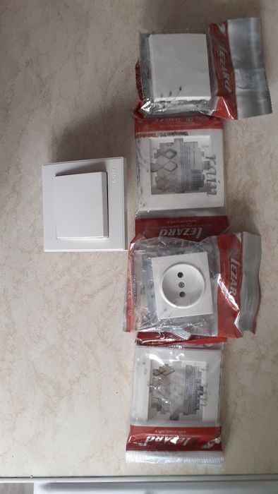 Продам новые упакованы розетки + выключатели