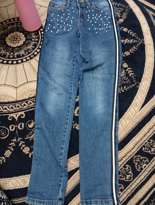 Spodnie jeans damskie