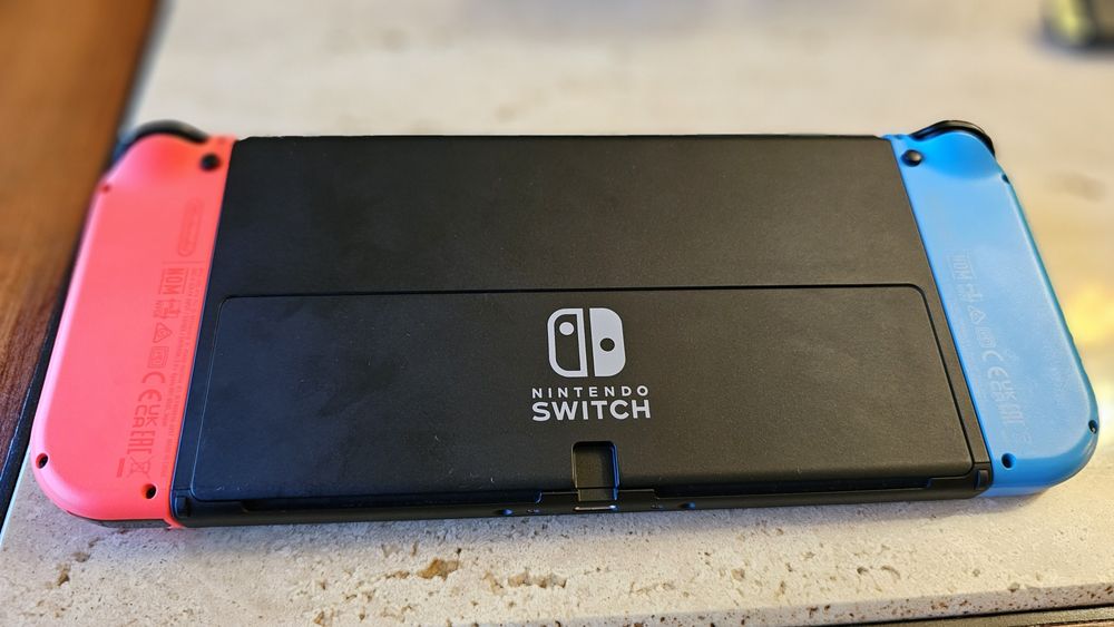 Nintendo Switch OLED 64GB (Neon Blue/Red) – Impecável