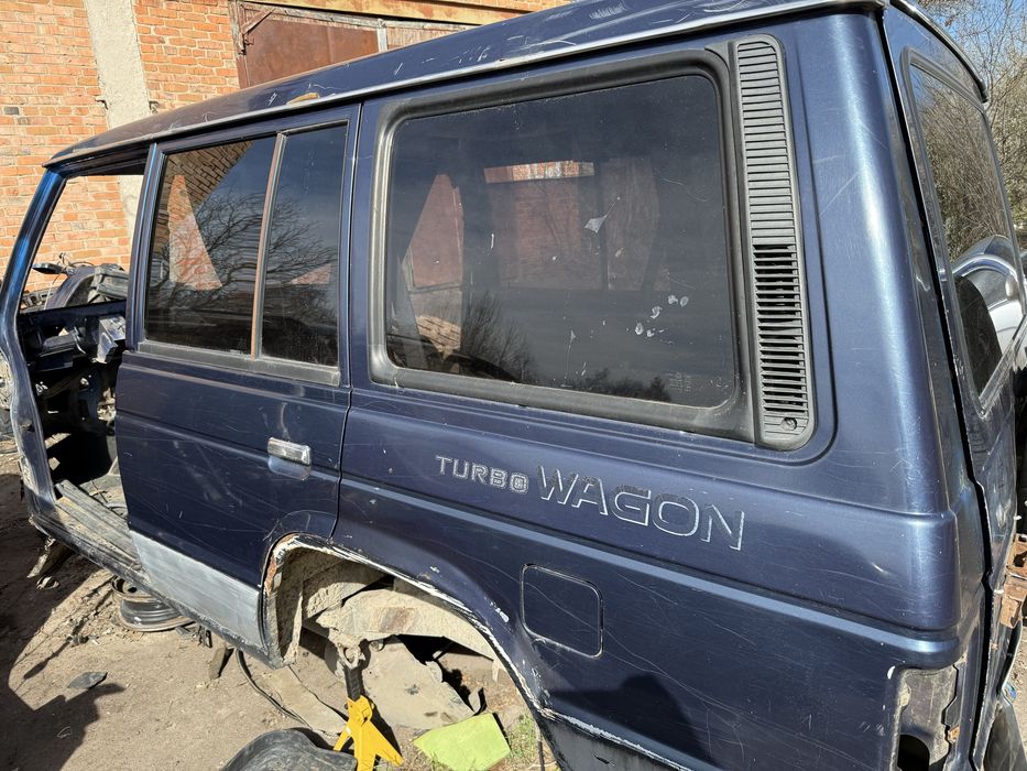 скло роздвижне праве Hyndai Galloper а також ліве