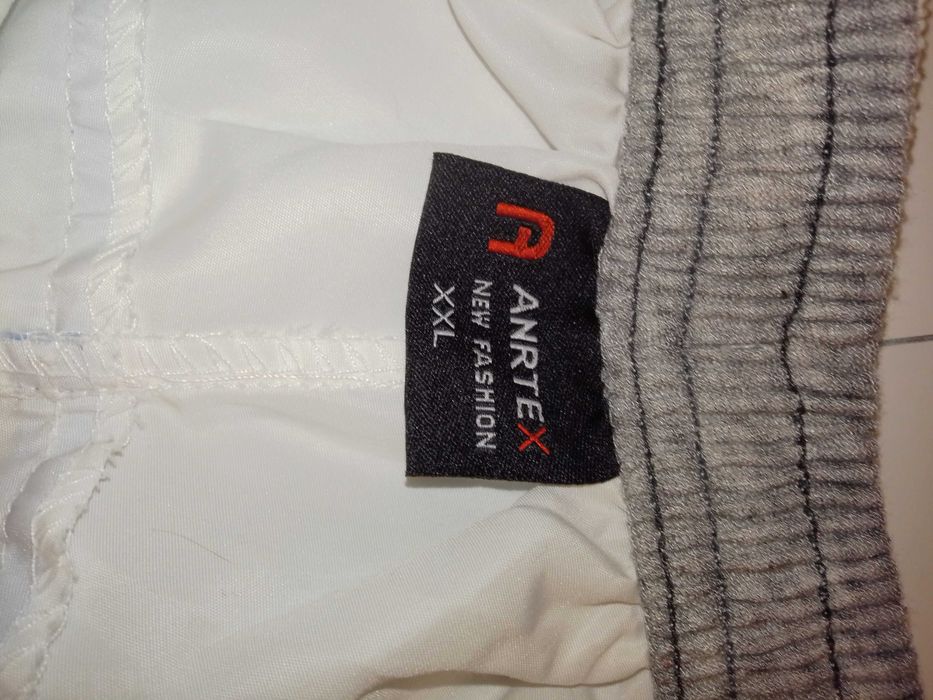 Spodnie białe szerokie nogawki