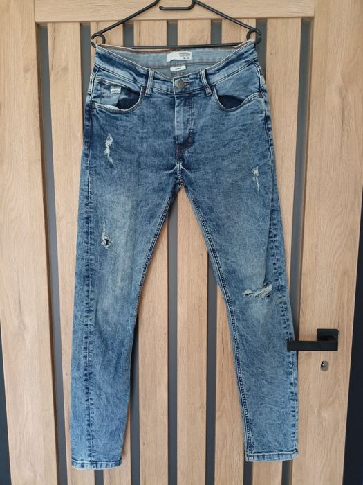 Sprzedam spodnie jeans Cropp 30/34