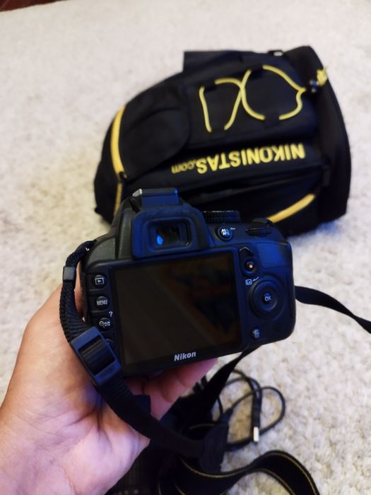 Nikon D3100 + lente extra