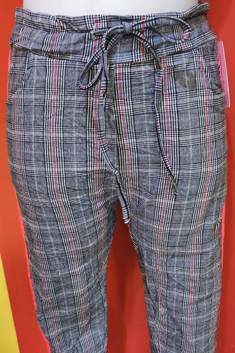 Spodnie w kratkę gnieciuchy lampas neon róż