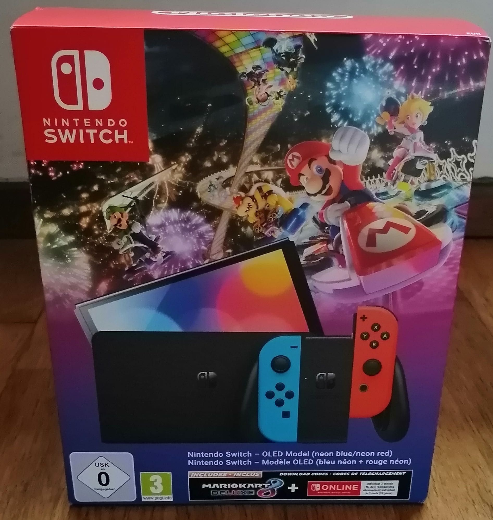 Consola Nintendo Switch OLED + Jogo Mario Kart Deluxe 8 (Formato Digital) +  3 Meses de NSW Online (Formato Digital)