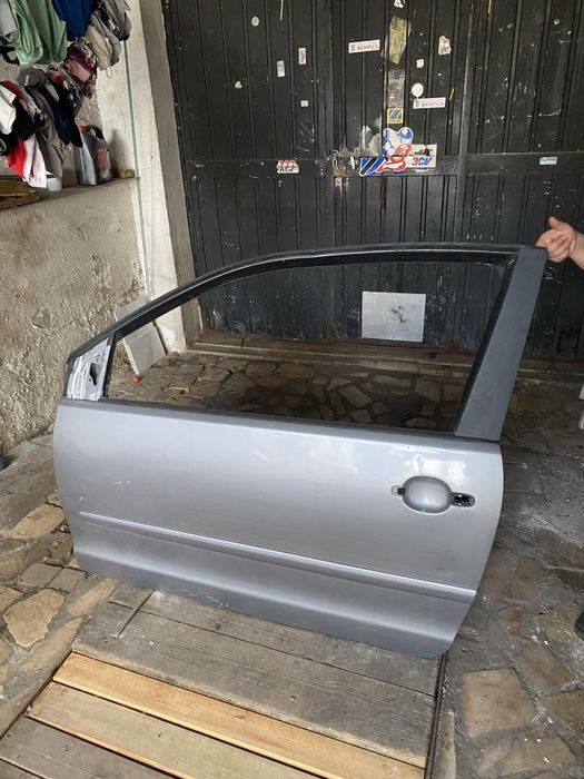 VW Porta esq Polo 9n