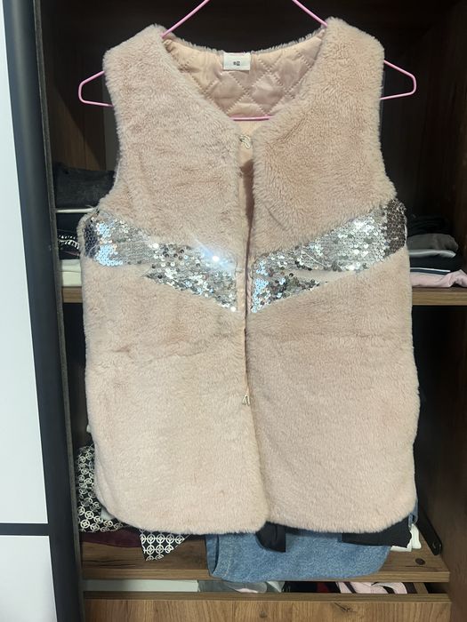 Безрукавка 134 розмір