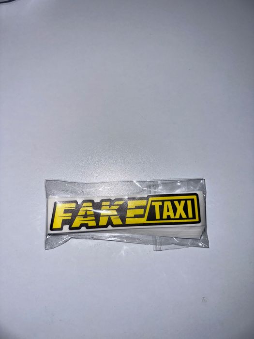 Autocolante “Fake Táxi” 100mm