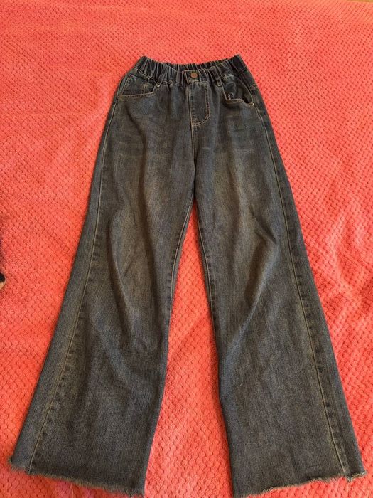 Джинси кльош сині