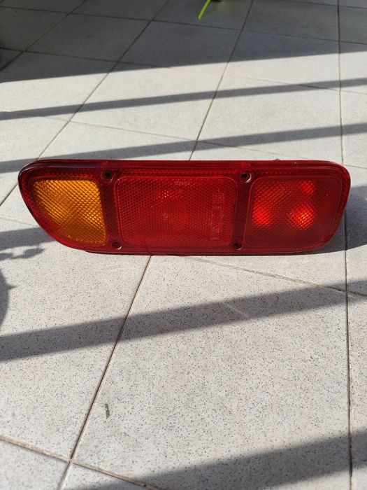 SEMINOVO- FAROLIM esquerdo Terrano ou Maverick - FAROL