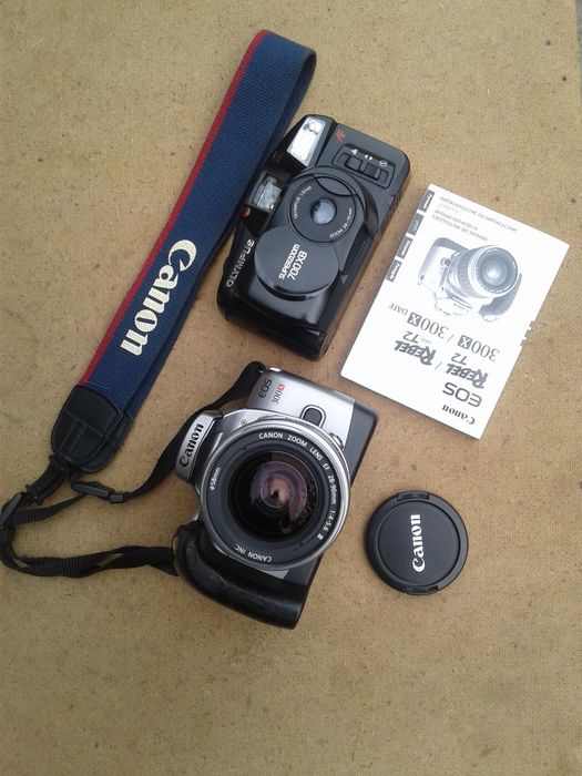 Фотоаппарат " Canon EOS 300X " , "Olympus Superzoom 700XB "