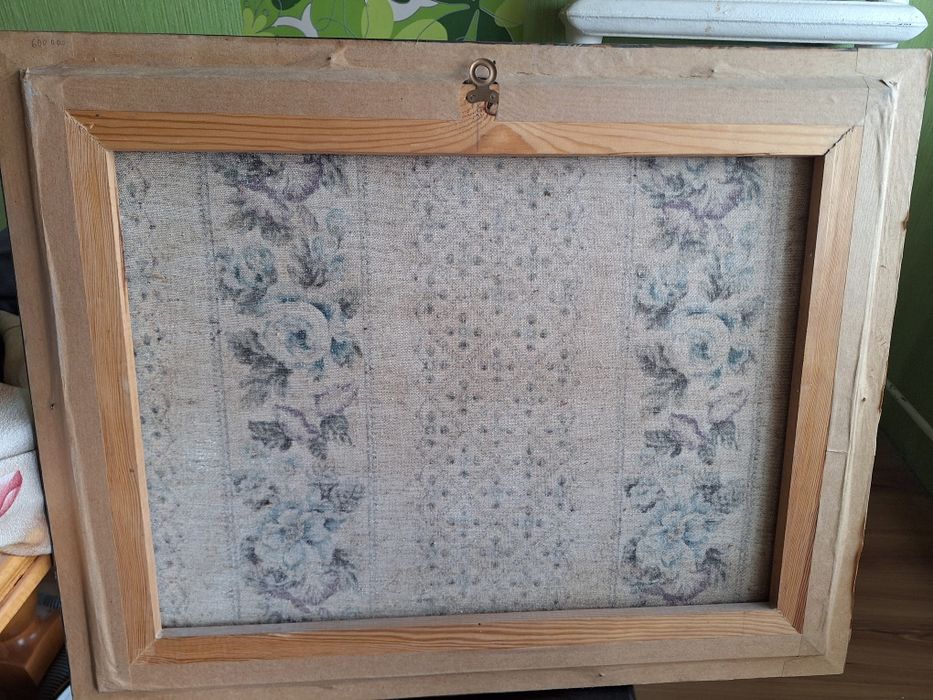 Obraz w w ciemnej ramie