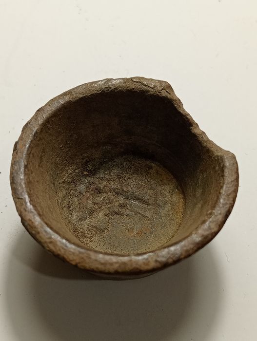 Peça antiga em metal