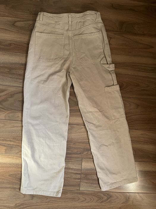 Biale spodnie cargo sinsay