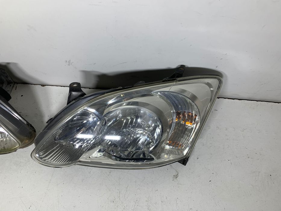 Prawy Lewy reflektor lampa EUROPA lampy przód toyota corolla E12 2006r