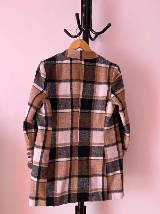 Casaco padrão quadrados