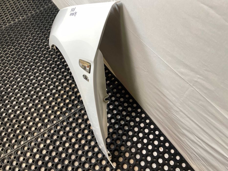 Błotnik przód przedni lewy opel astra v k kod lakieru: y40r 2015-