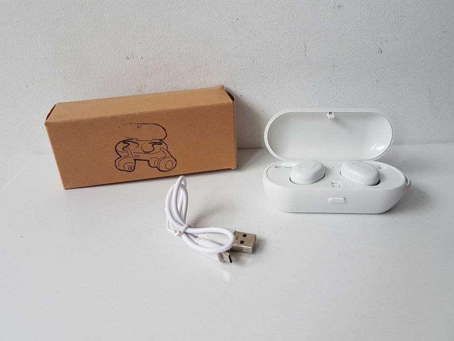 Nowe bezprzewodowe słuchawki douszne białe USB czas pracy 2-3 godziny