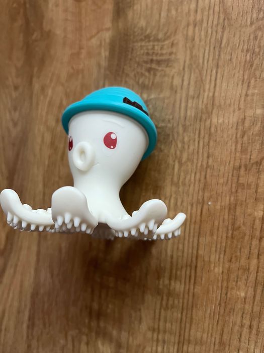 Gryzak ośmiornica Mombella niebiesko-biała zabawka