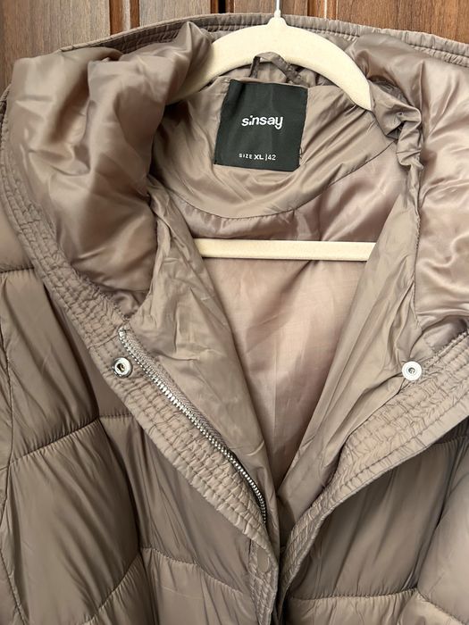 Пуховик новий бежевий какао 42 XL