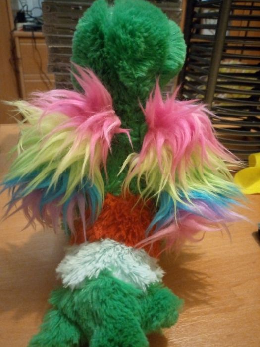 Говоряча папуга. Іграшка.