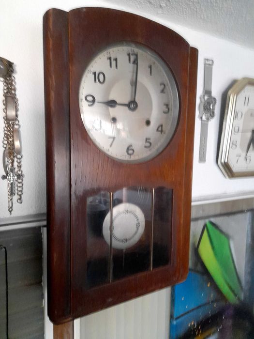 Relogio de.pendulo vintage