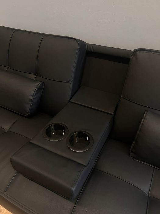 Sofá cama preto couro