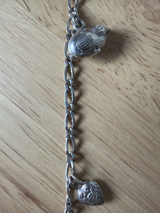 Pulseira com berlocos de prata