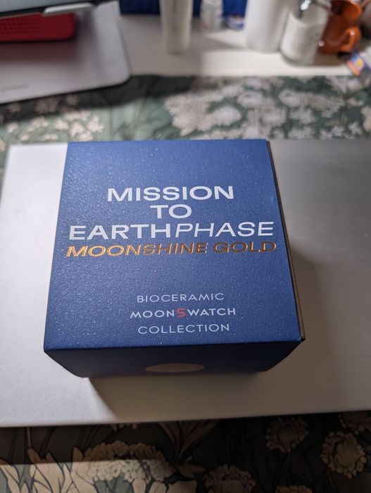 Swatch x omaga Snoopy mission to earthphase