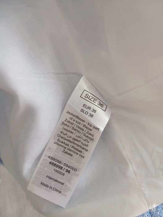Niebieski żakiet tweedowy damski Orsay