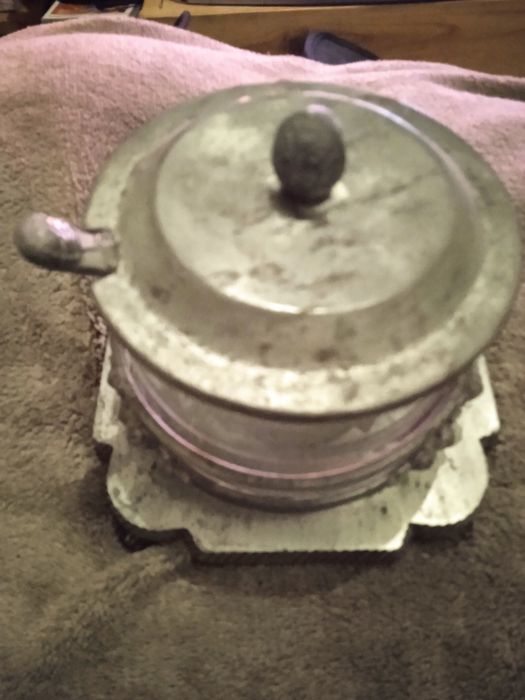 Very old sugar bowl made of tin and glass