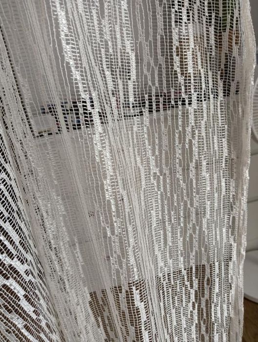 Тюль на кільцях.