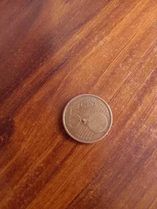 Moeda 5 cêntimos com defeito