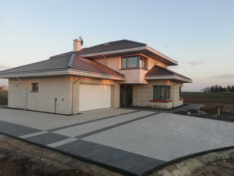 Układanie kostki brukowej , montaż ogrodzeń , mycie kostki brukowej