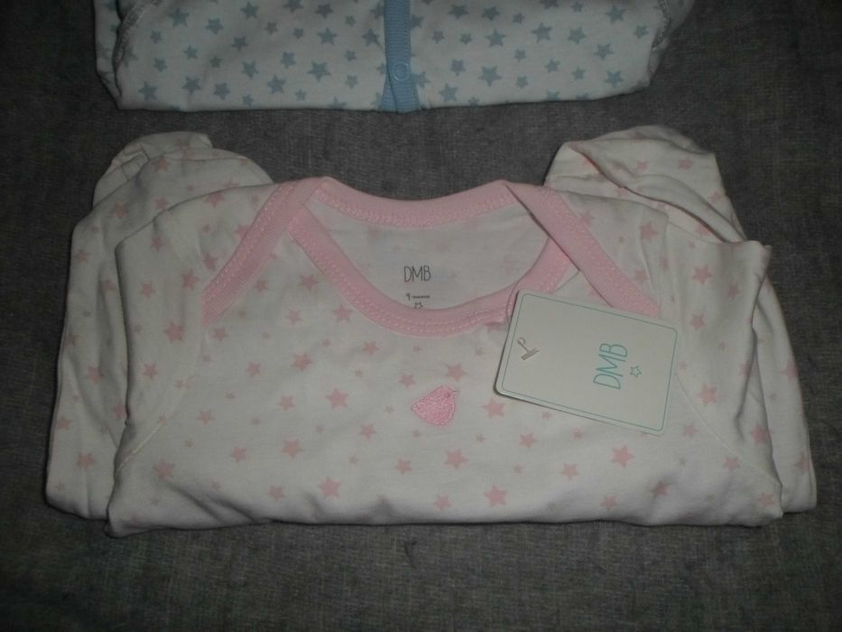 1 casaquinho e 1 bodws novos com etiqueta  para menina