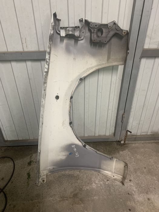 Guarda lamas esquerdo toyota corolla ke70